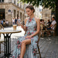 👗🌺 Halterové šaty s rozparkem a květinovým vzorem – SLEVA 49%! Smyslné, lehké a perfektní na léto, pláž nebo slavnostní příležitosti 🌸
