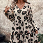 Dámské splývavé šaty s leopardím vzorem a výstřihem do V